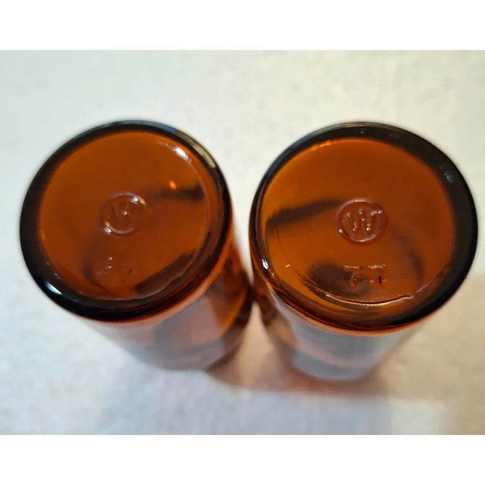 2 W Encircled Amber Glass Bottles 3 3/8
